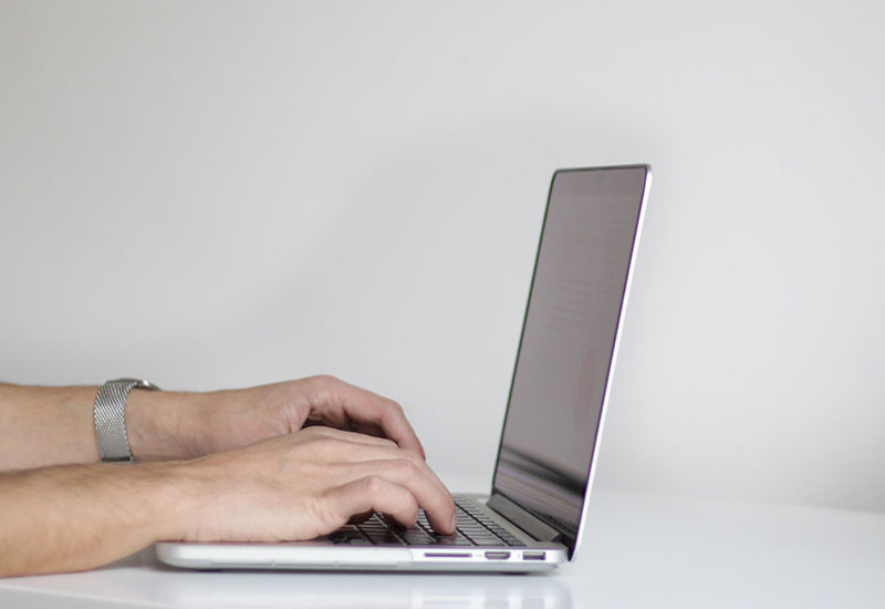 person using laptop