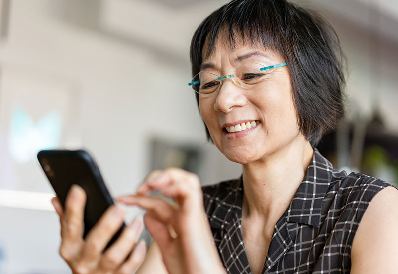 person using a mobile phone to surf the web