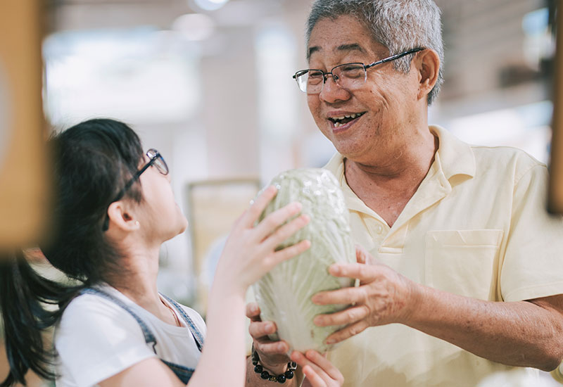 father and daughter sharing a joke